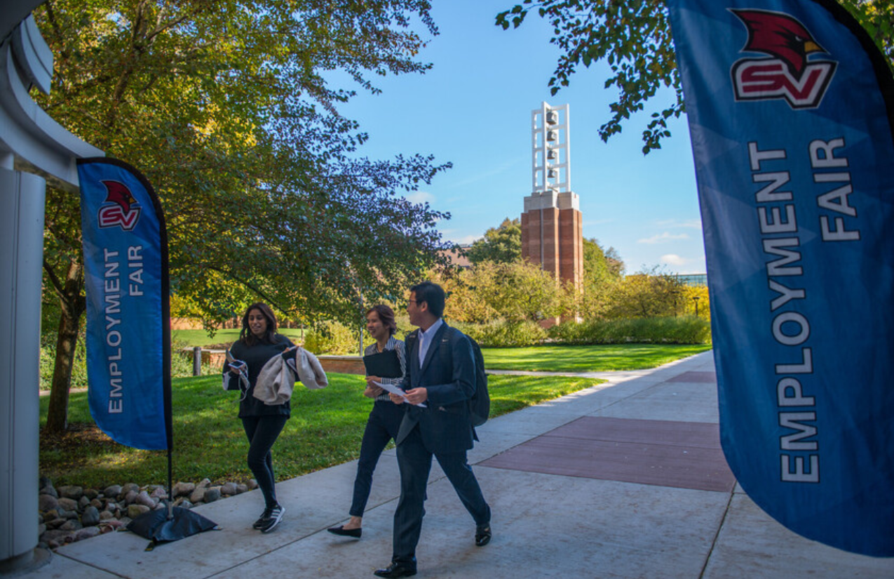 Students walking into Employement fair